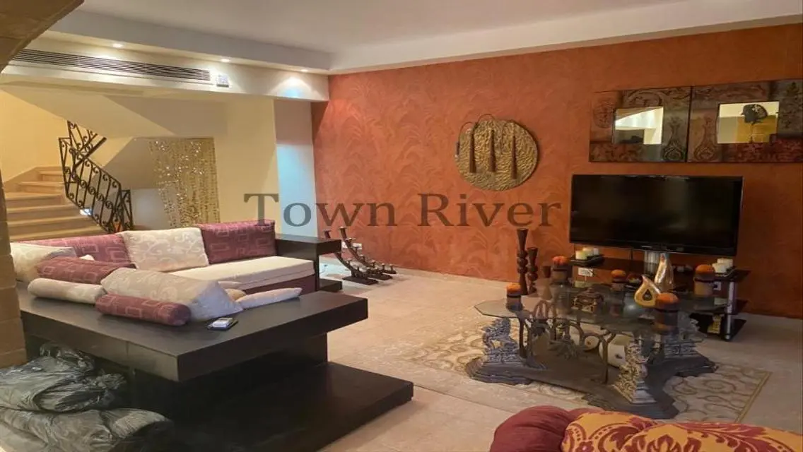 Stunning Villa with Private Garden and Community Pool for Sale