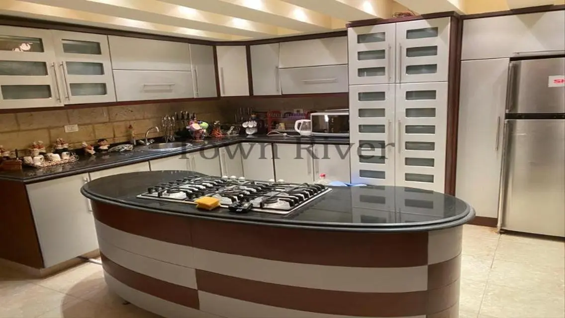 Stunning Villa with Private Garden and Community Pool for Sale