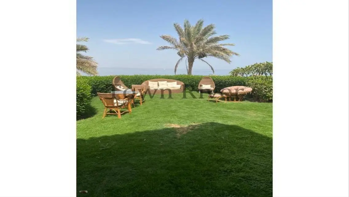 Stunning Villa with Private Garden and Community Pool for Sale