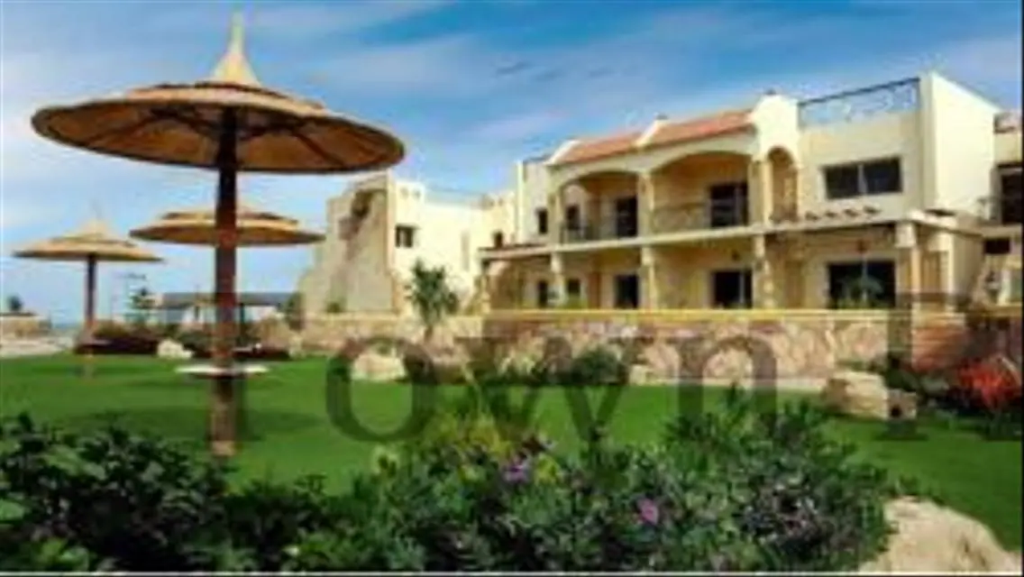 Stunning Villa with Private Garden and Community Pool for Sale