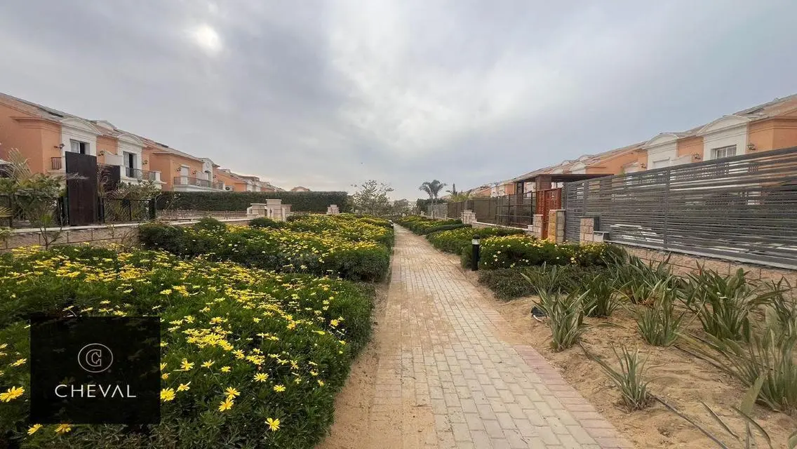 Invest in a luxurious property with private garden and balcony