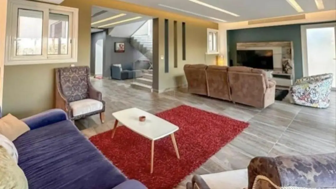 Luxurious 4-Bedroom Villa with Garden and Shared Pool