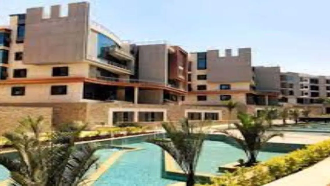 Luxury Residence with Balcony and Shared Pool in Prime Location