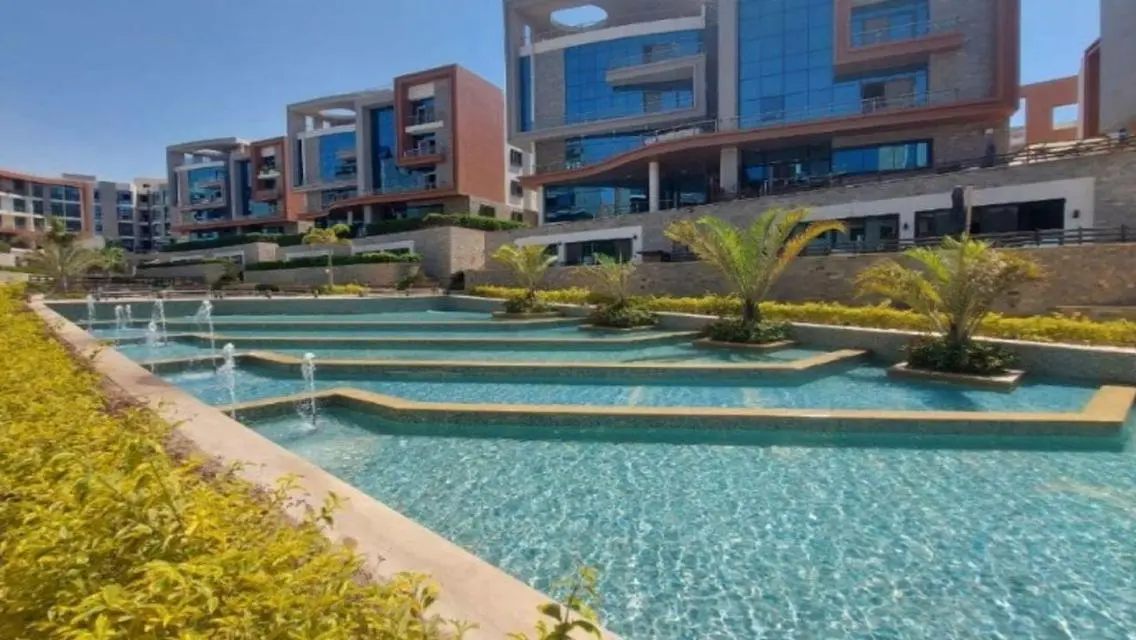 Luxury Residence with Balcony and Shared Pool in Prime Location