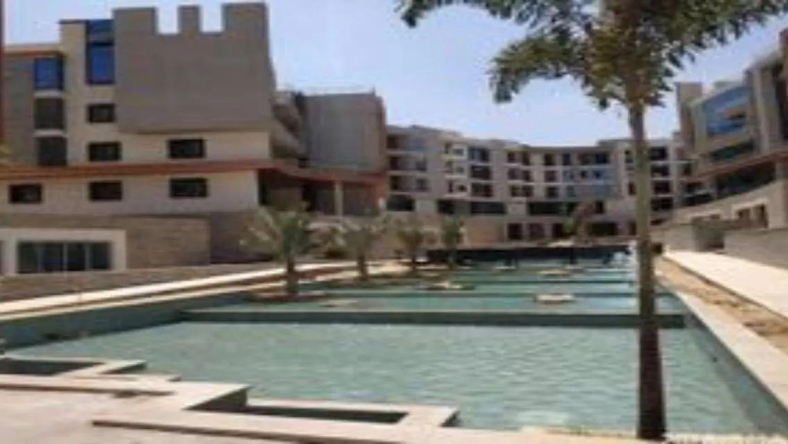 Luxury Residence with Balcony and Shared Pool in Prime Location
