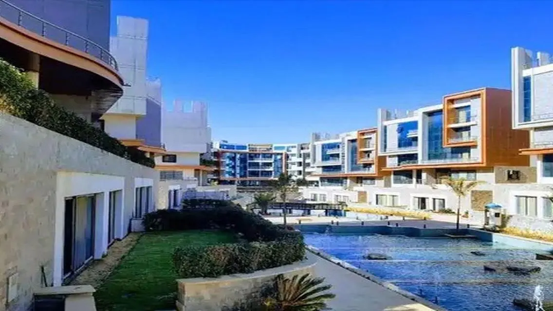 Luxury Residence with Balcony and Shared Pool in Prime Location