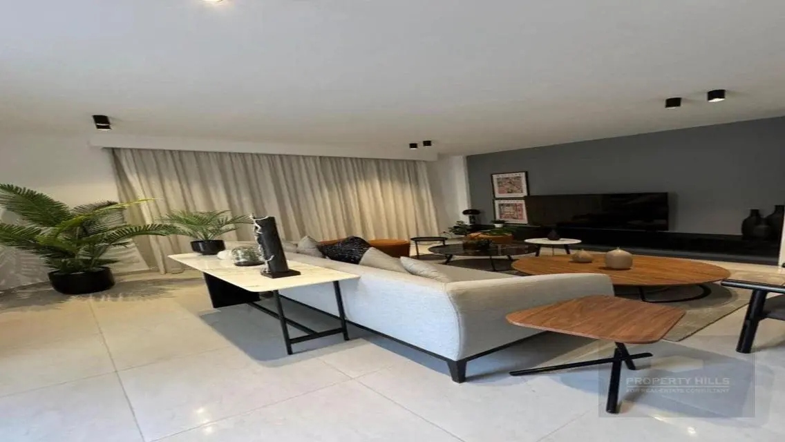 Luxurious 3-Bedroom Apartment with Garden and Shared Pool