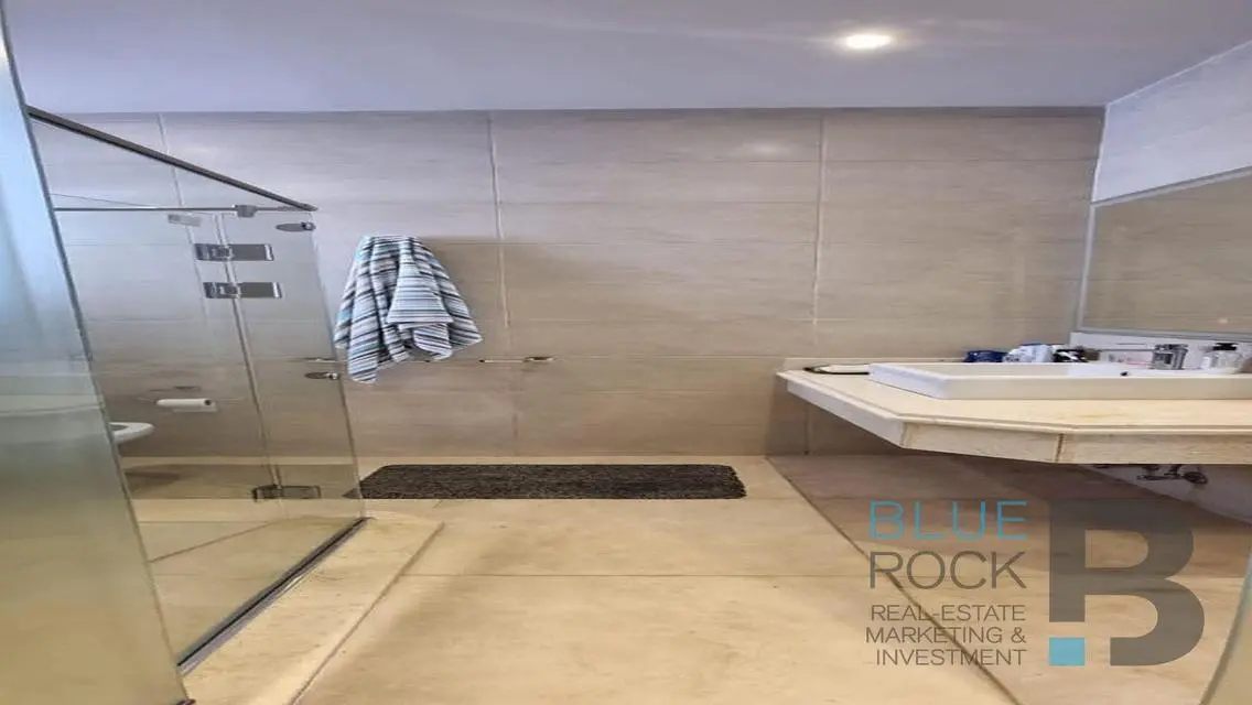 Luxurious Home with Private Garden and Shared Pool