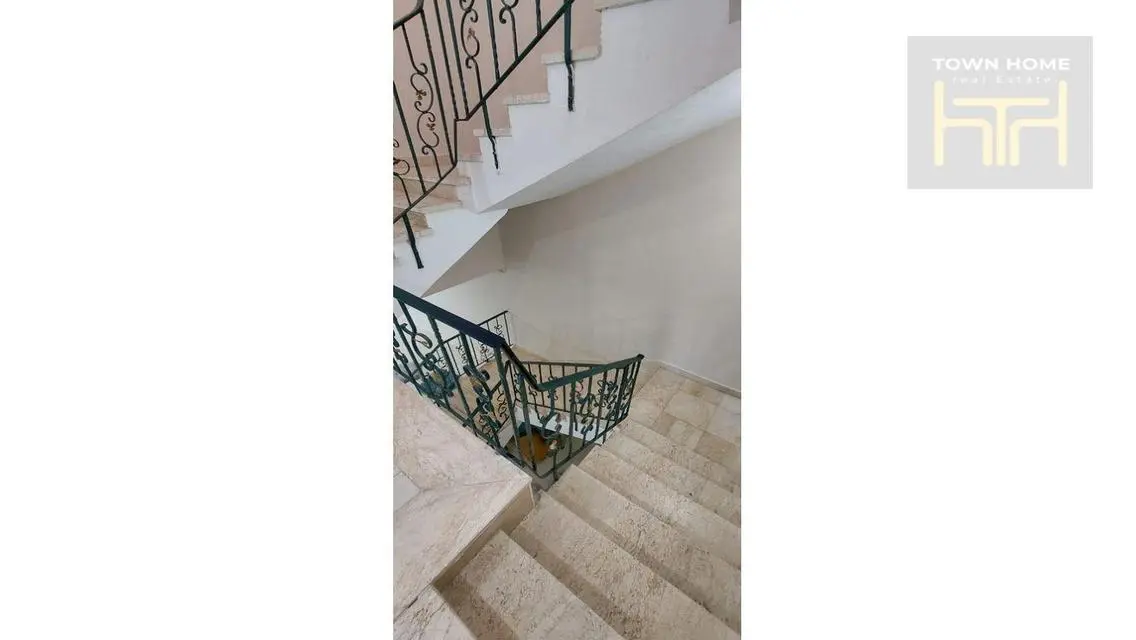 Luxury Apartment with Private Garden in Prime Location