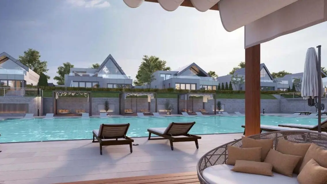 Luxurious Villa for Sale with Private Garden and Shared Pool