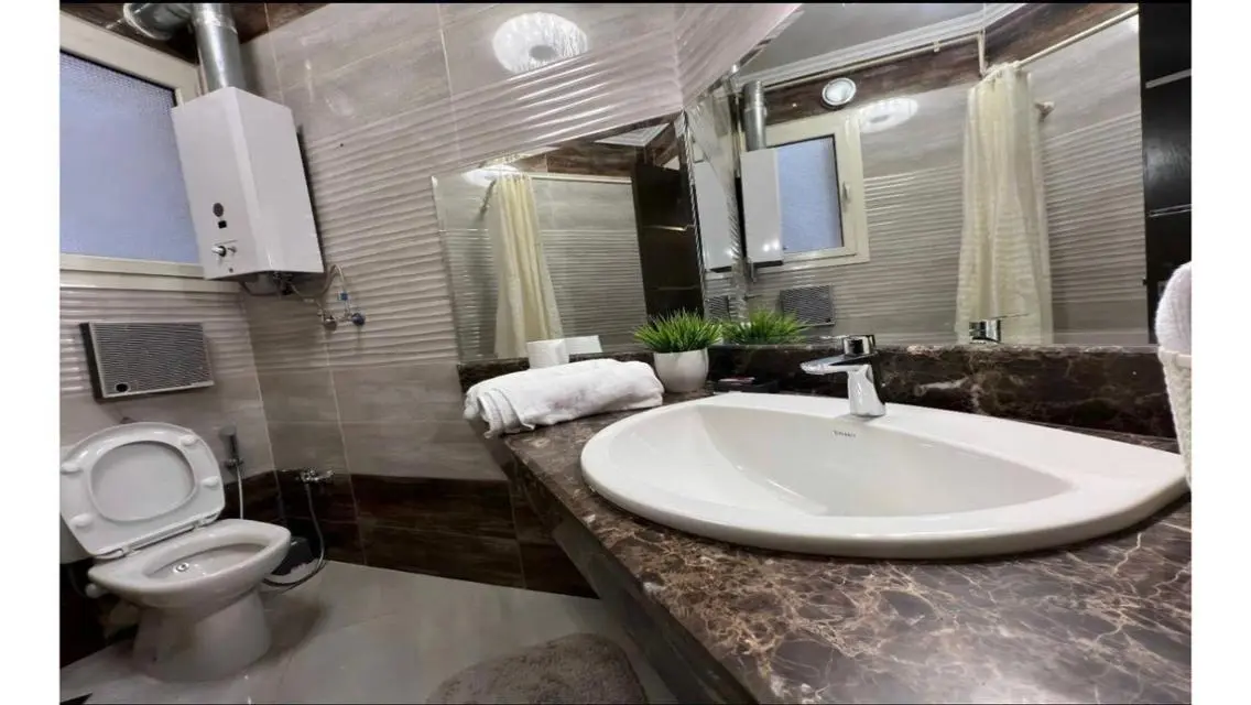 Luxury 3-Bedroom Apartment with Private Pool and Garden in Prime Location