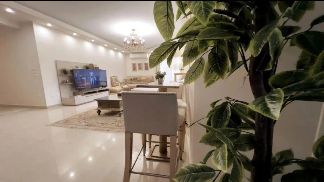 Luxury 3-Bedroom Apartment with Private Pool and Garden in Prime Location