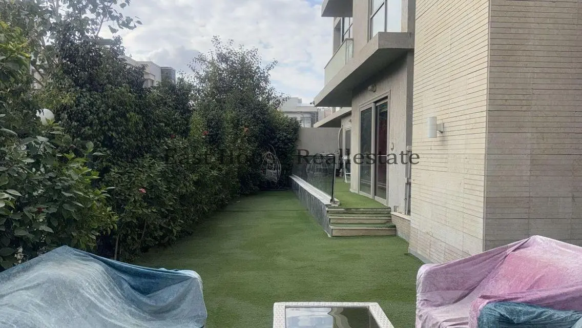 Luxury Apartment with Spacious Balconies and Private Garden