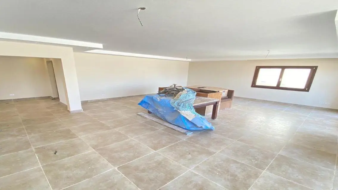 Luxury Apartment with Private Garden and Shared Pool