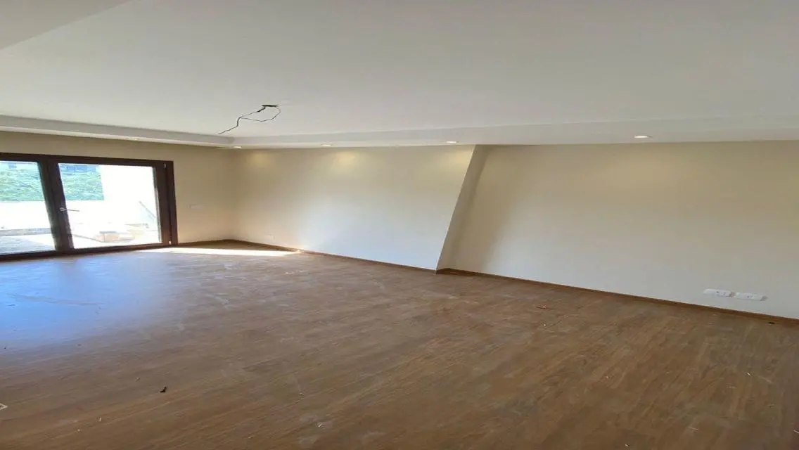 Luxury Apartment with Private Garden and Shared Pool