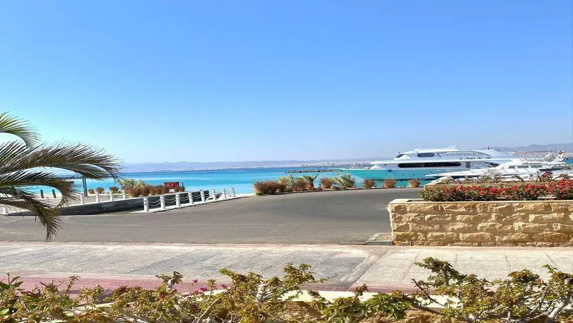 Luxury Apartment with Private Garden and Pool in Prime Location