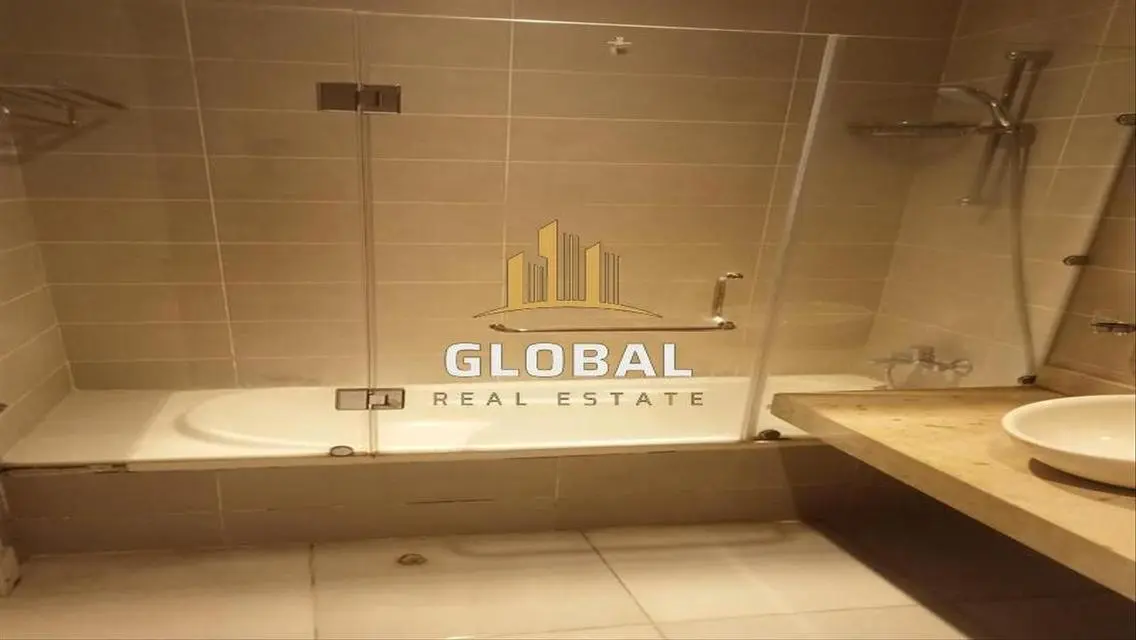 Luxury Apartment with Central Air Conditioning and Private Garden for Sale