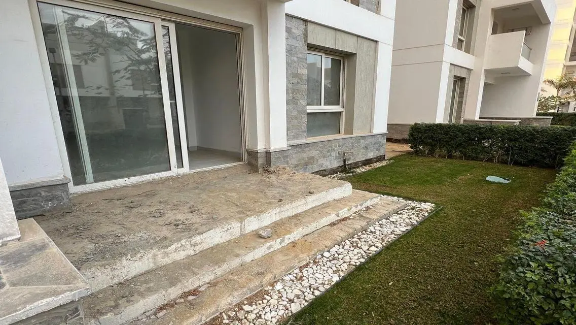 Luxury Apartment with Private Garden and Shared Pool in City Center