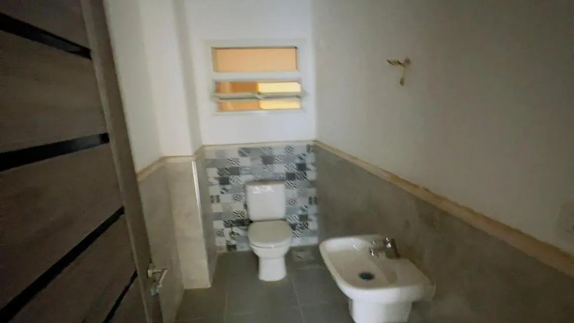 Luxury Apartment with Private Garden and Shared Pool in City Center