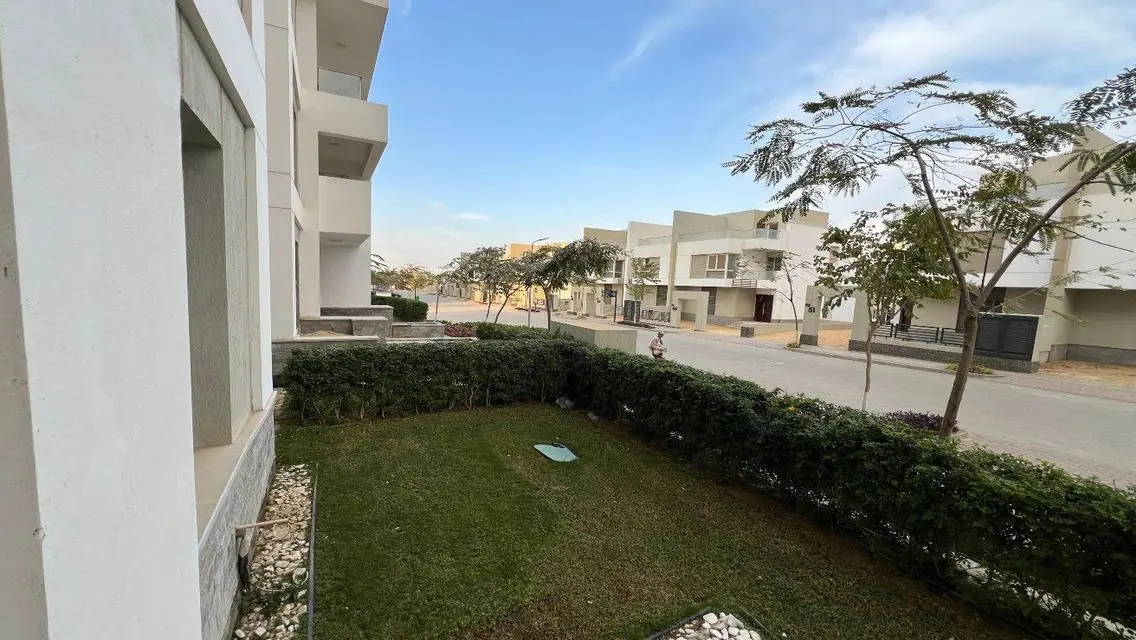 Luxury Apartment with Private Garden and Shared Pool in City Center