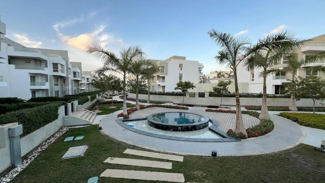 Luxury Apartment with Private Garden and Shared Pool in City Center