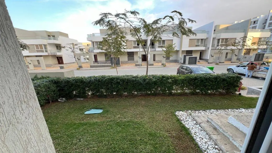 Luxury Apartment with Private Garden and Shared Pool in City Center