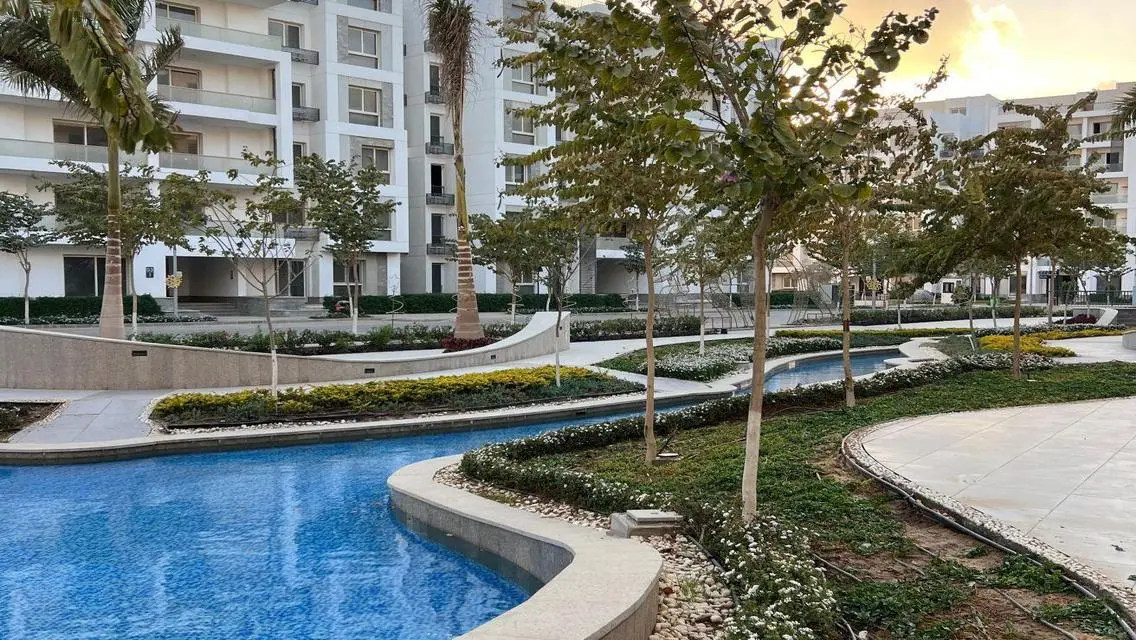 Luxury Apartment with Private Garden and Shared Pool in City Center