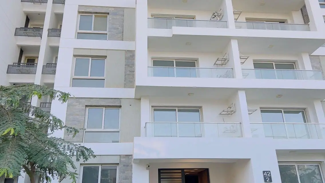 Luxury Apartment with Private Garden and Shared Pool in City Center