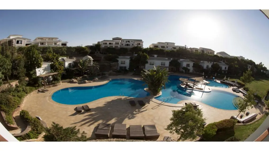 Stunning Apartment with Private Garden and Shared Pool