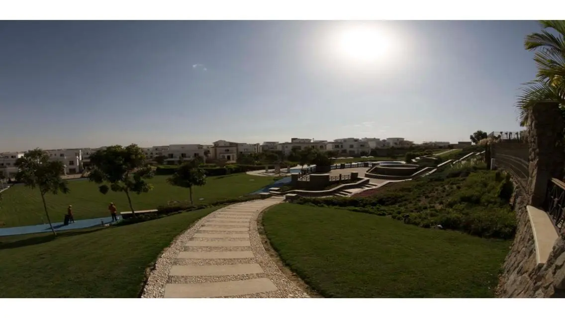 Stunning Apartment with Private Garden and Shared Pool