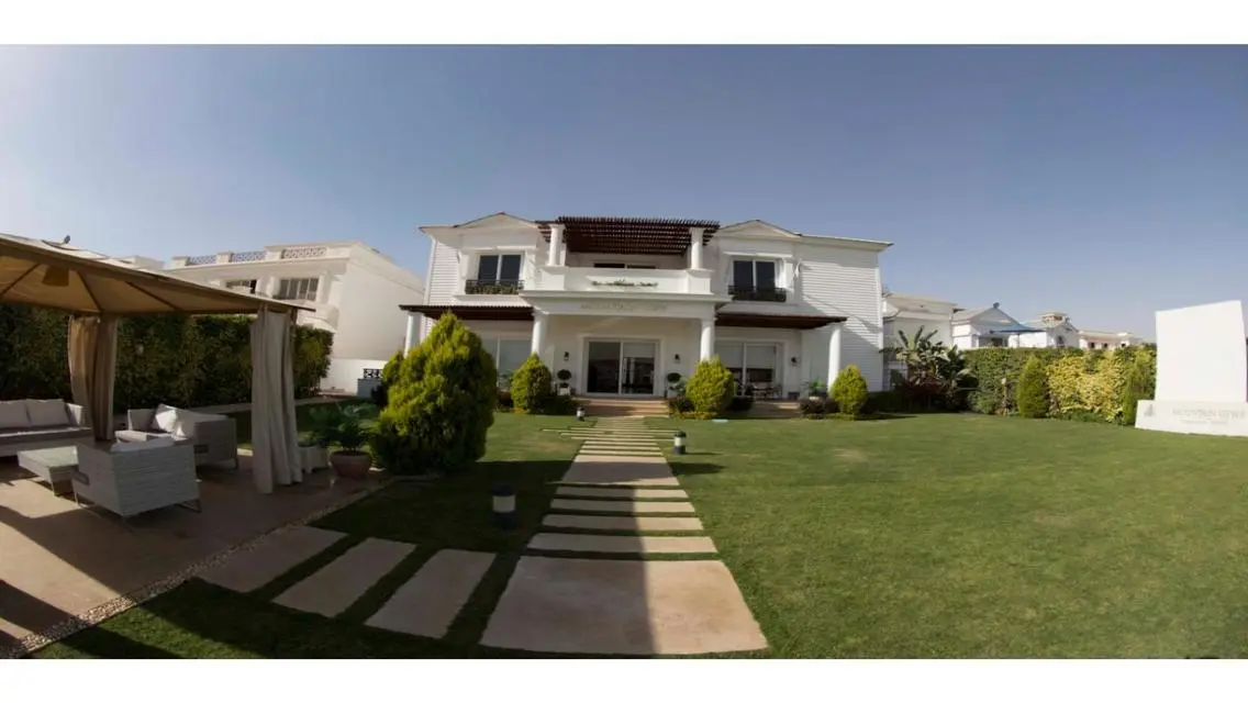 Stunning Apartment with Private Garden and Shared Pool