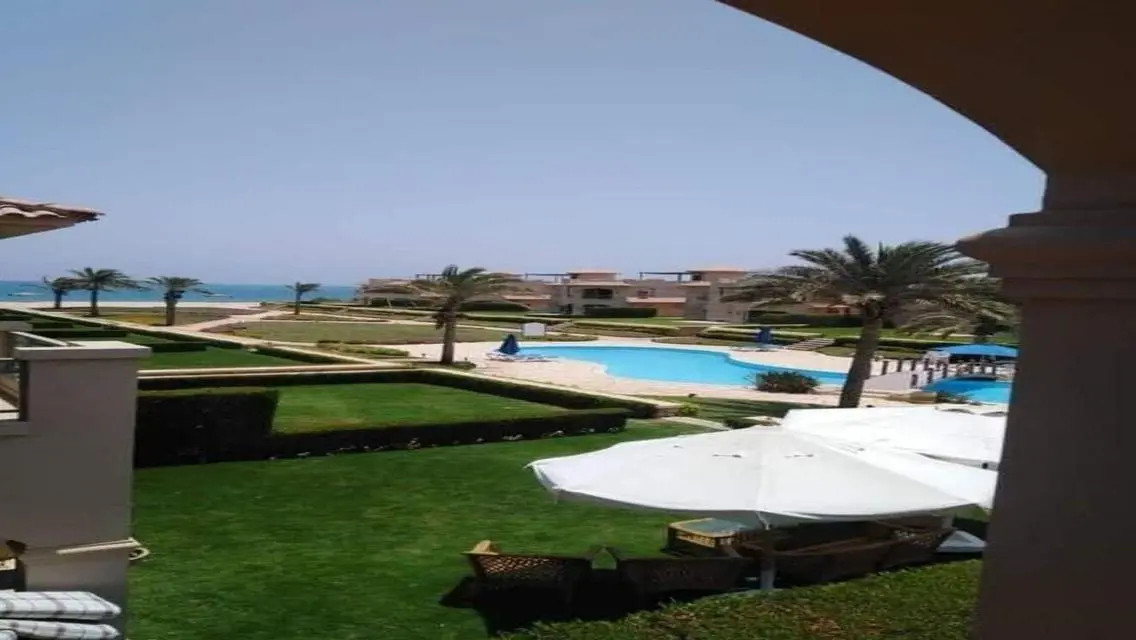 Luxury Apartment with Private Garden and Shared Pool