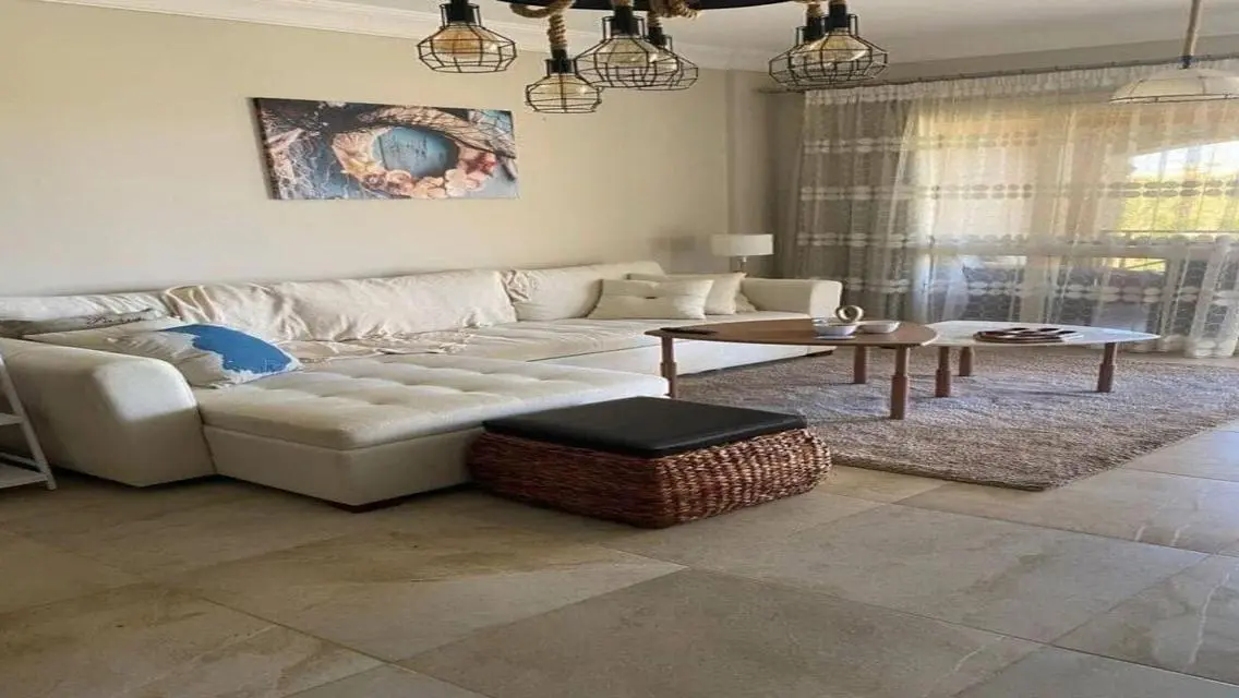 Luxury Apartment with Private Garden and Shared Pool