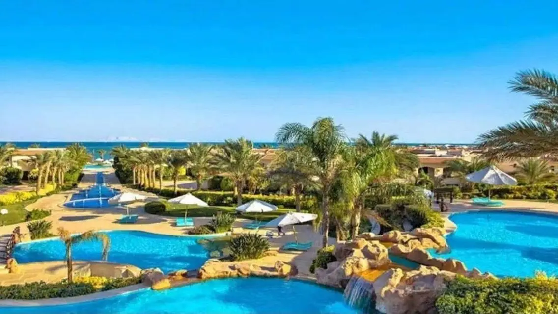 Luxury Apartment with Private Garden and Shared Pool