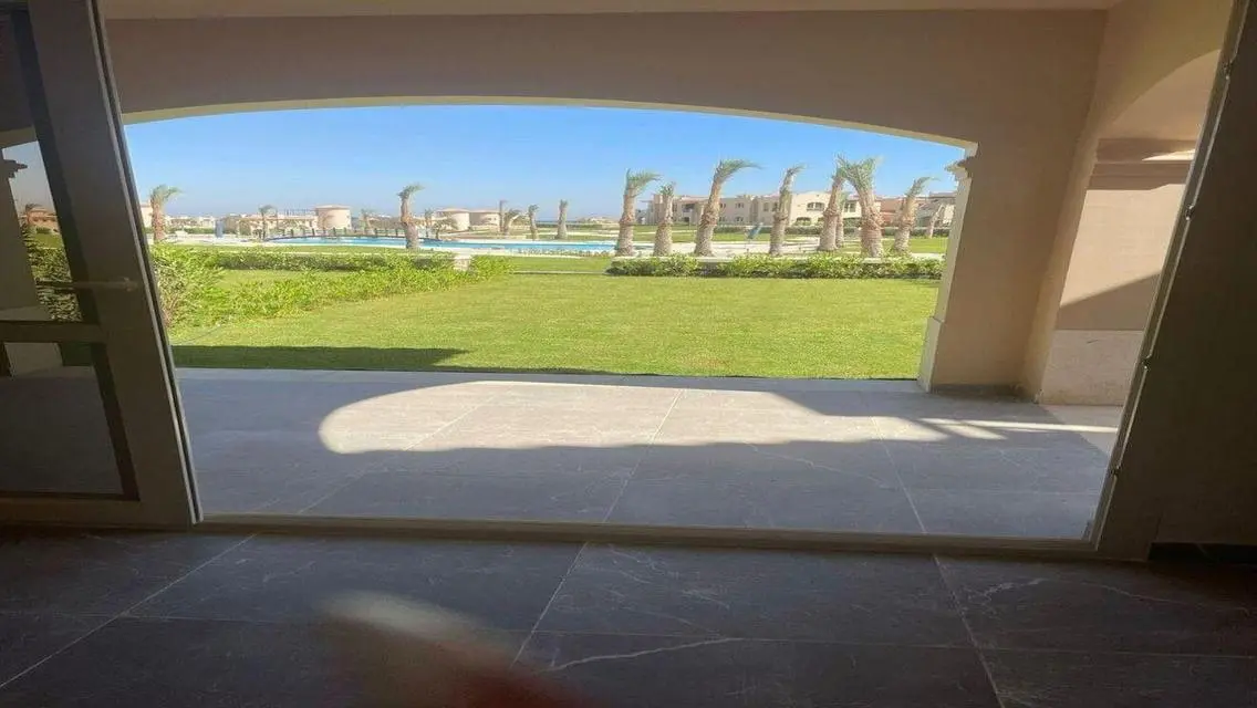 Luxury Apartment with Private Garden and Shared Pool