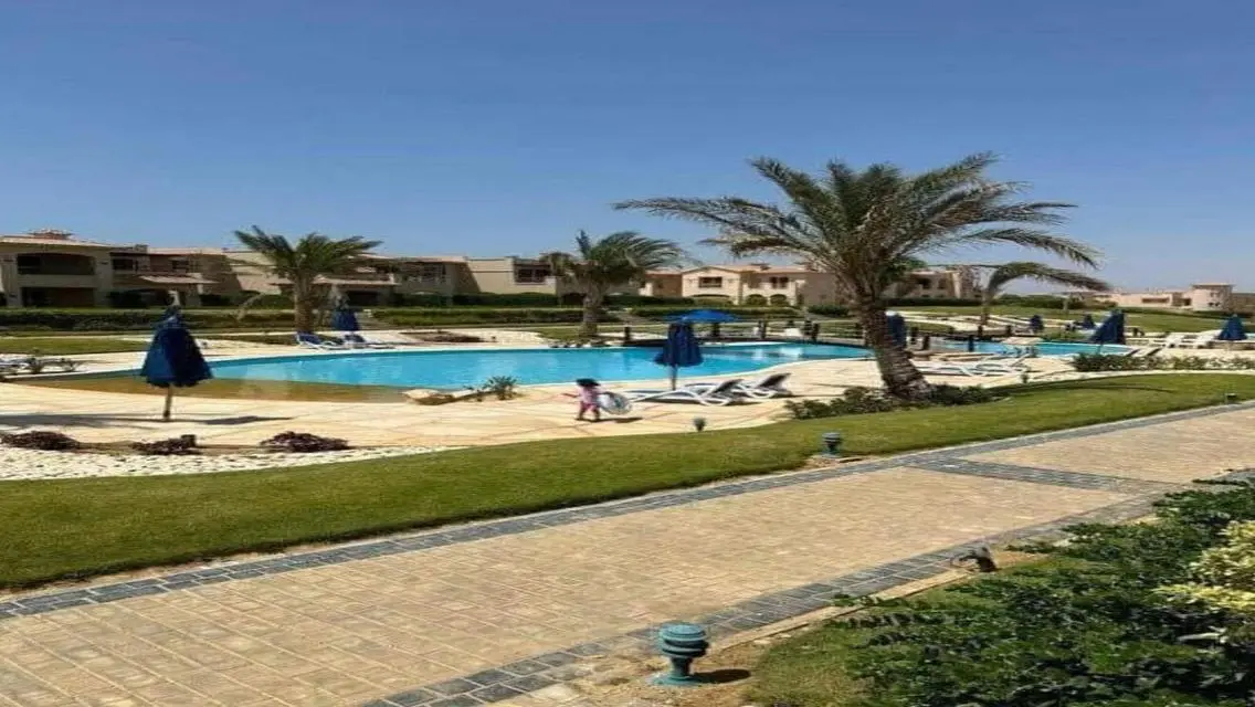 Luxury Apartment with Private Garden and Shared Pool