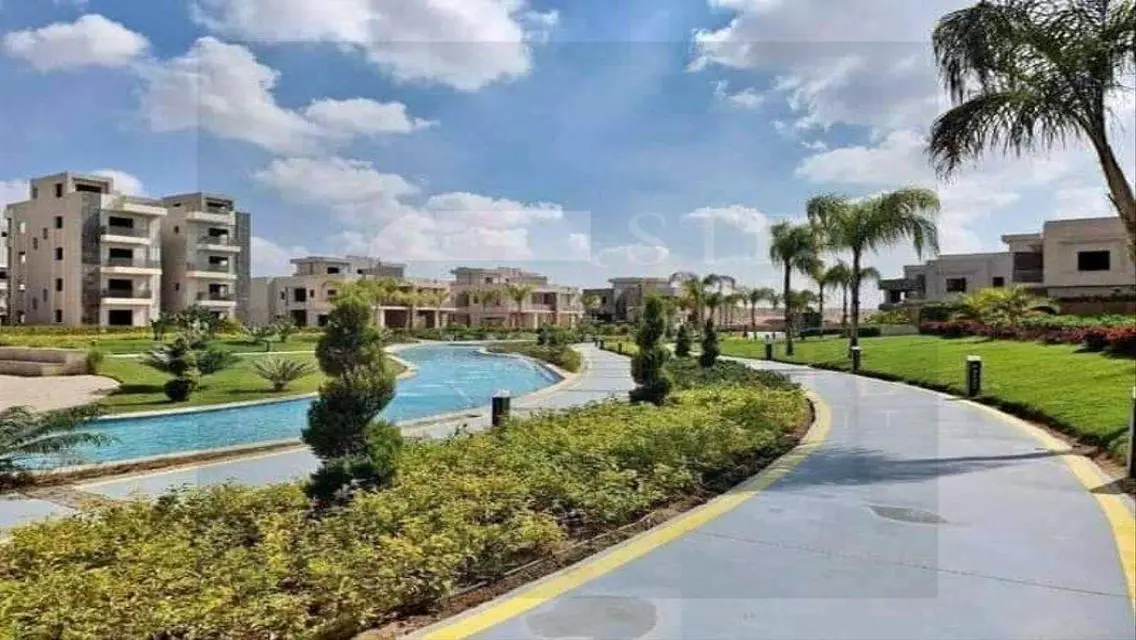 Luxury Apartment with Private Garden and Pool in Prime Location