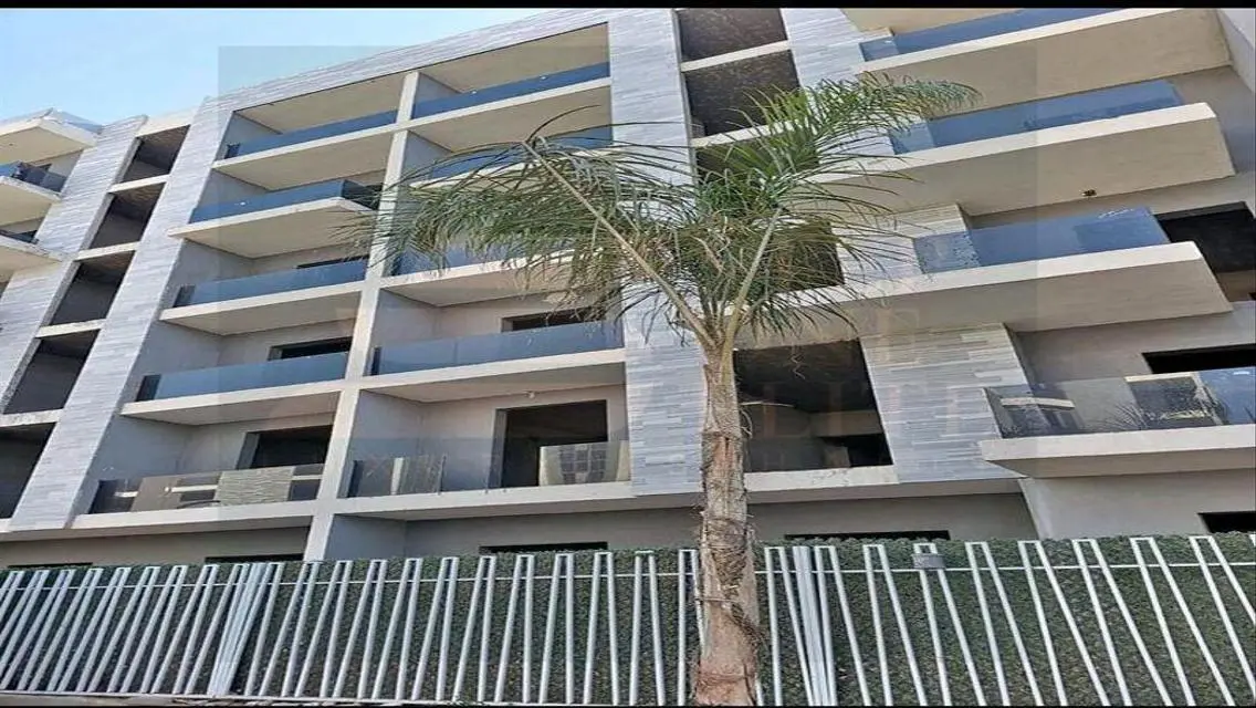 Luxury Apartment with Private Garden and Pool in Prime Location