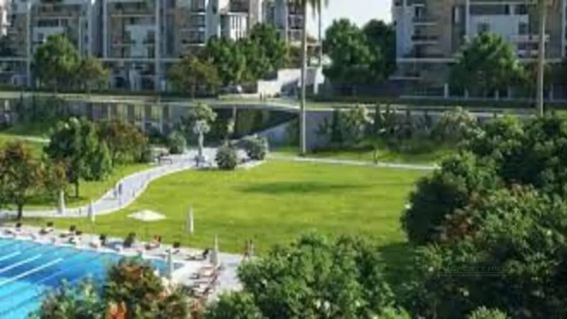 Luxury 3-Bedroom Apartment with Private Garden and Shared Pool