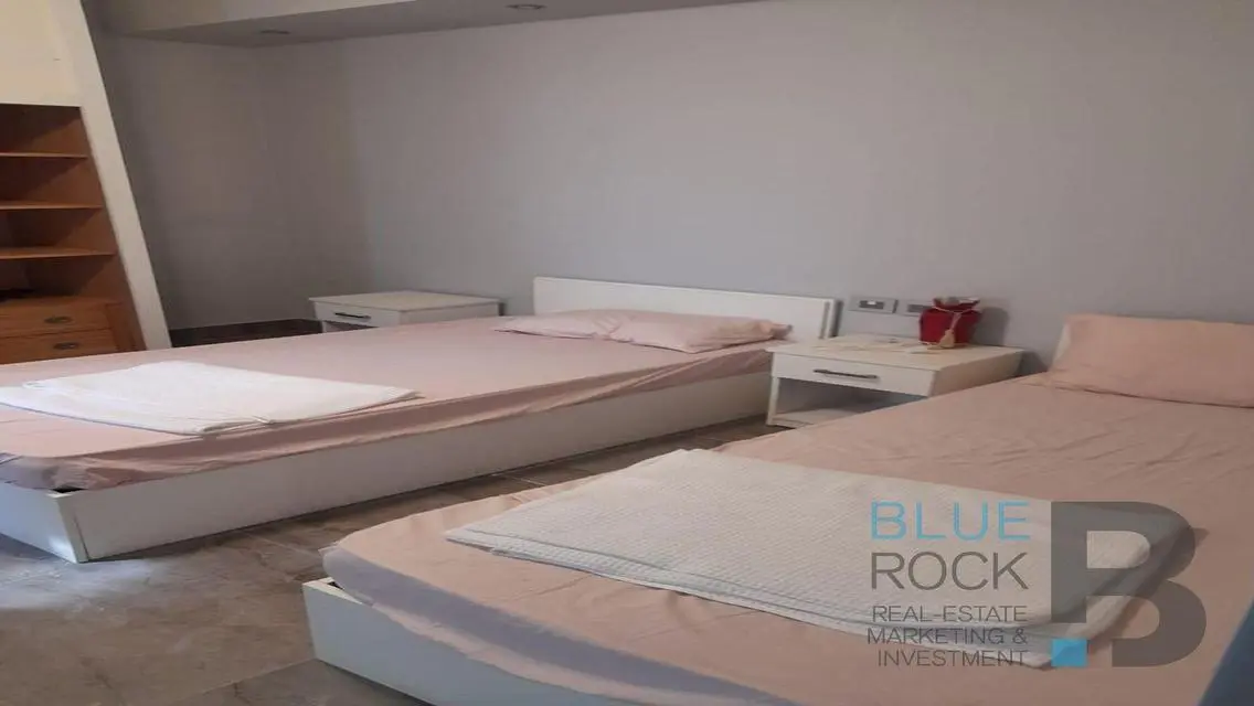 Luxury Apartment with Private Garden and Shared Pool