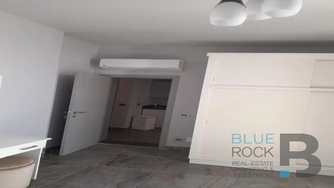 Luxury Apartment with Private Garden and Shared Pool