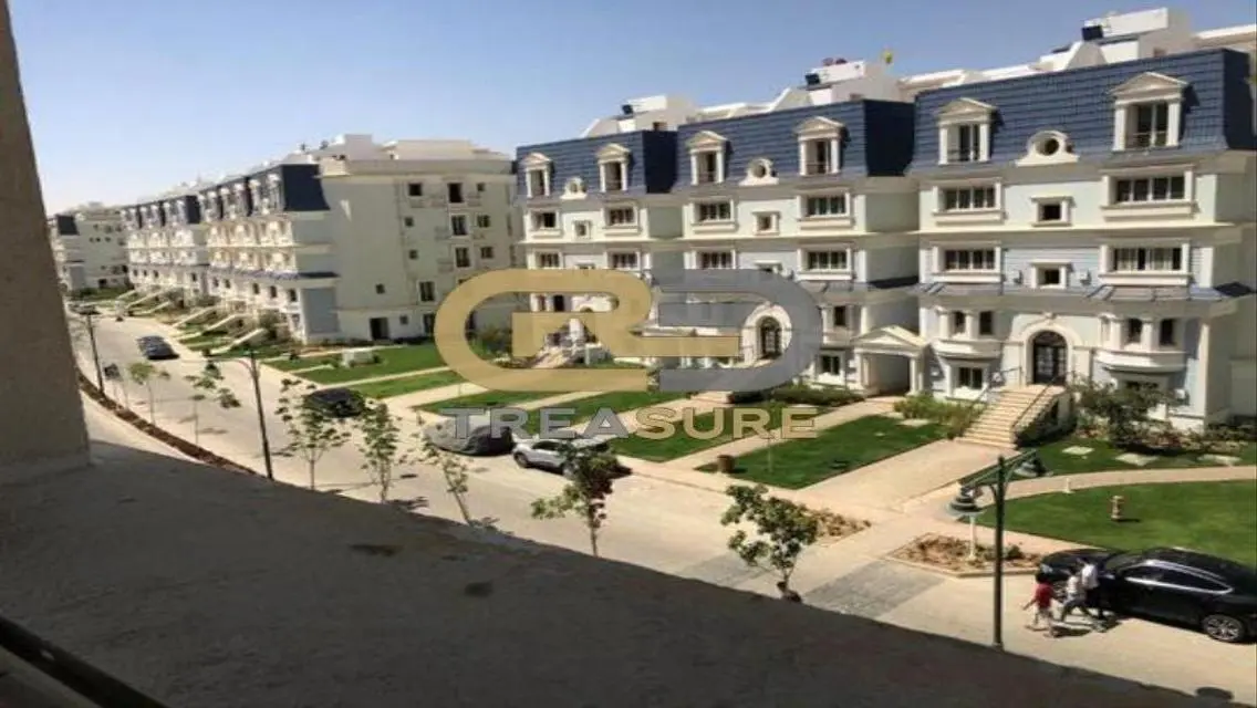 كنز العقارات: شقة بأنظمة أمان متكاملة