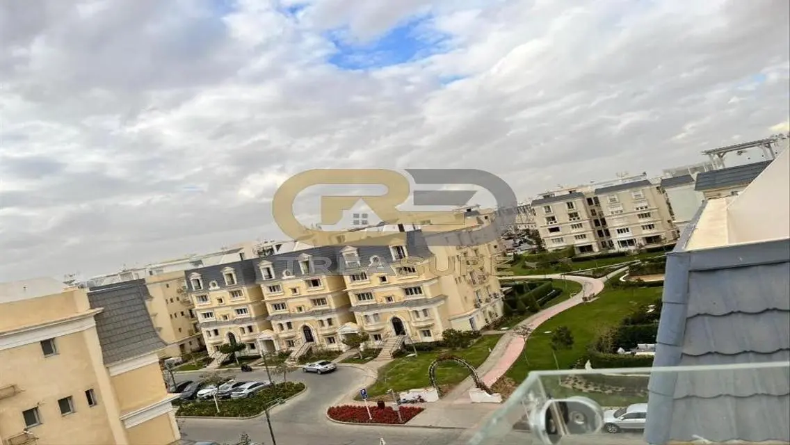 كنز العقارات: شقة بأنظمة أمان متكاملة