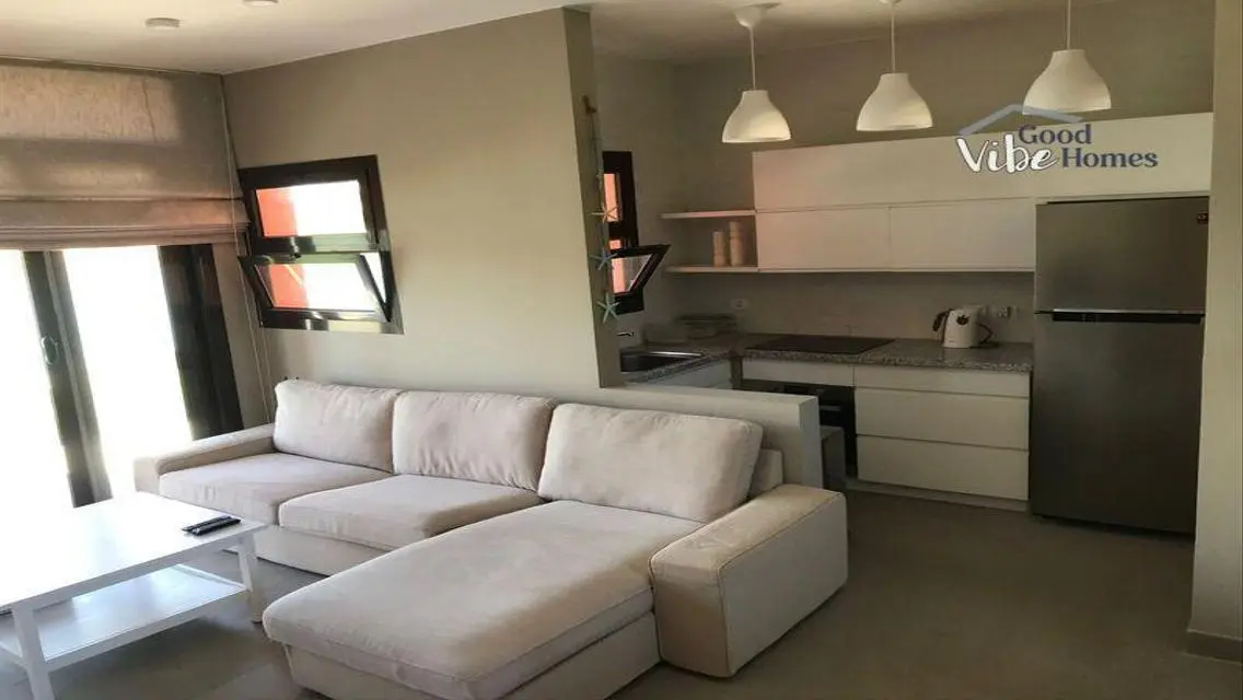 Luxury Apartment with Private Garden and Shared Pool