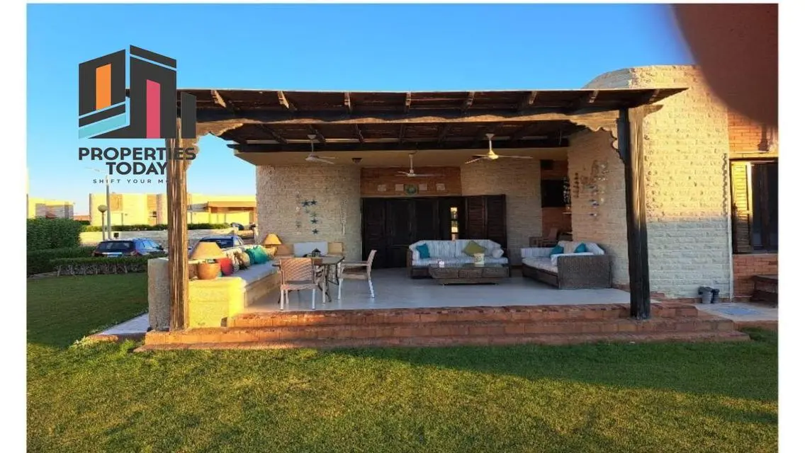 Luxury Villa with Private Garden and Shared Pool for Sale in Prime Location