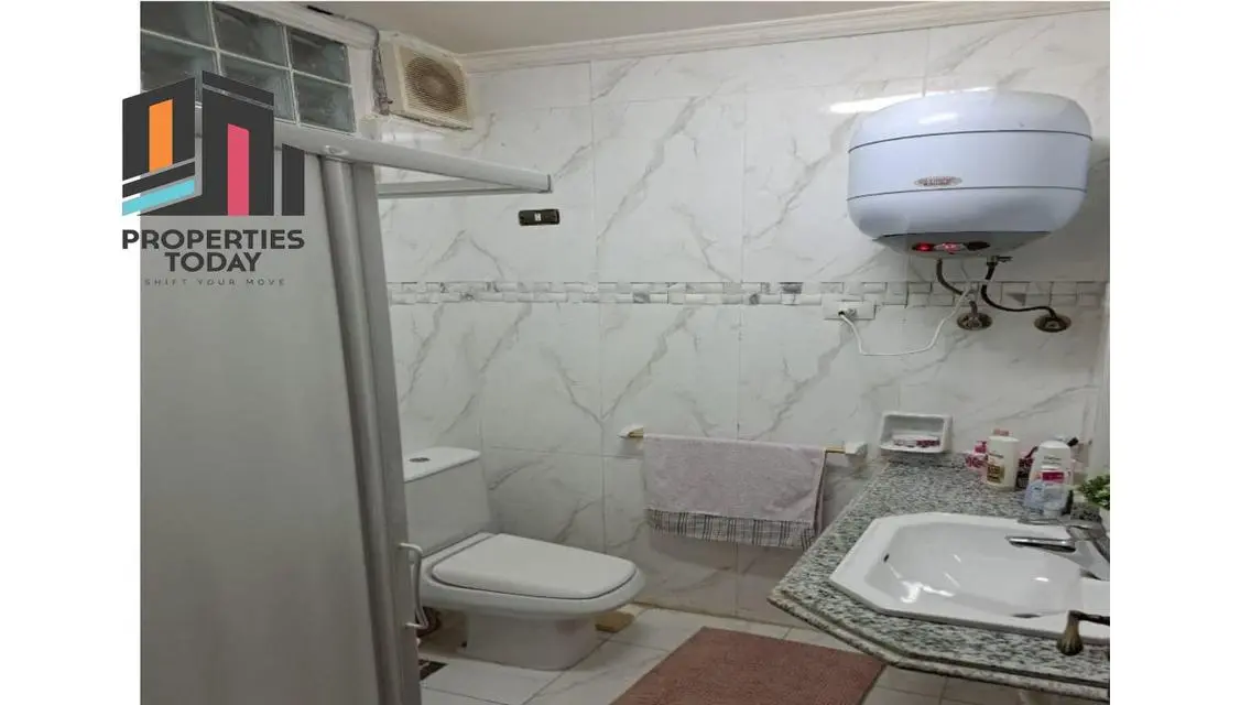 Luxury Villa with Private Garden and Shared Pool for Sale in Prime Location