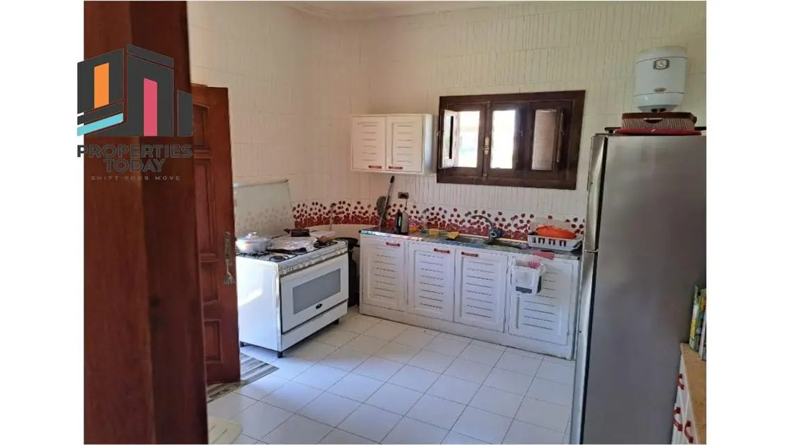 Luxury Villa with Private Garden and Shared Pool for Sale in Prime Location