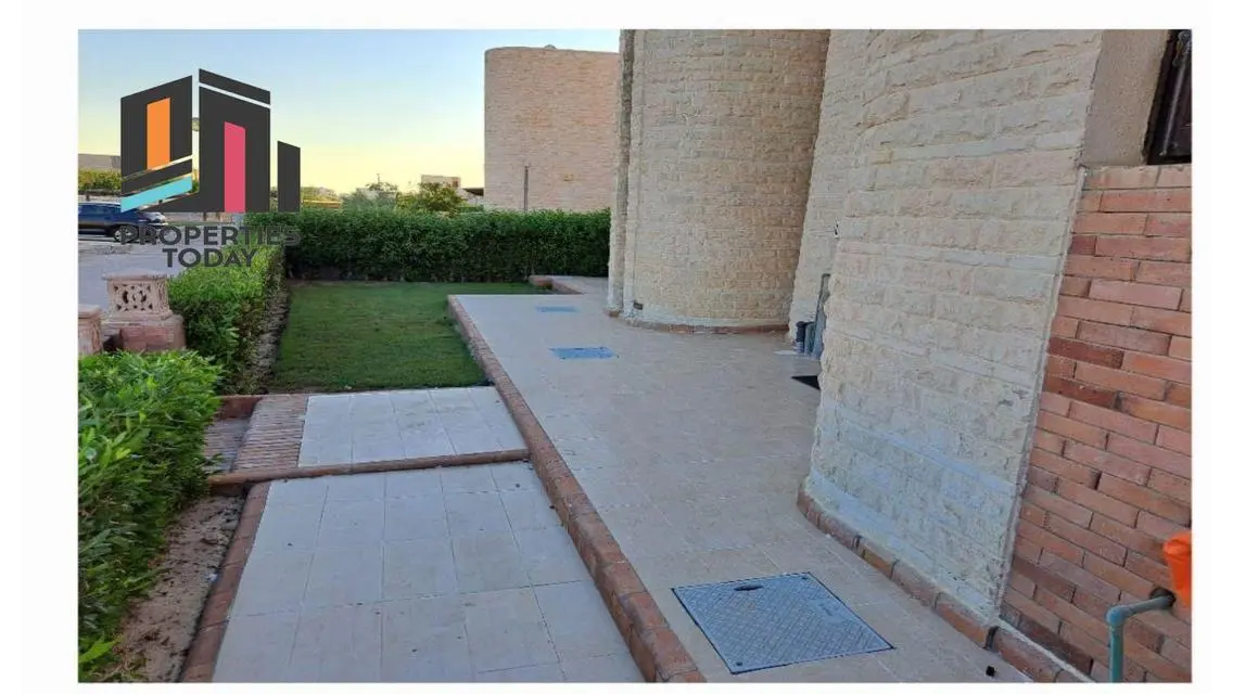 Luxury Villa with Private Garden and Shared Pool for Sale in Prime Location