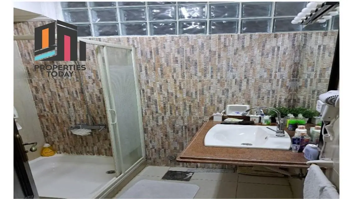Luxury Villa with Private Garden and Shared Pool for Sale in Prime Location