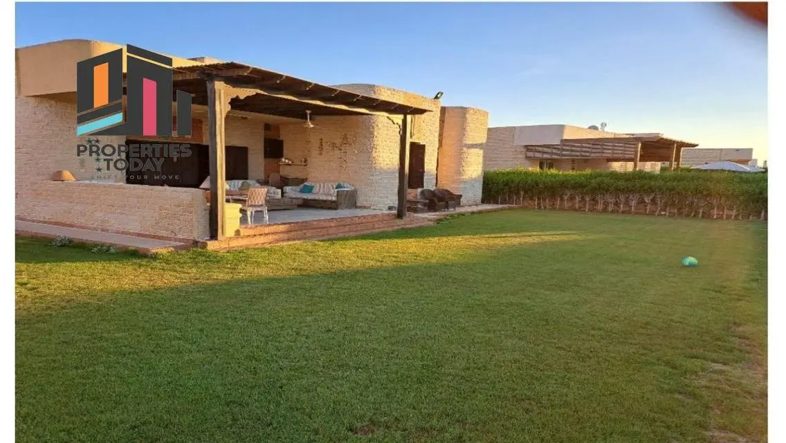 Luxury Villa with Private Garden and Shared Pool for Sale in Prime Location
